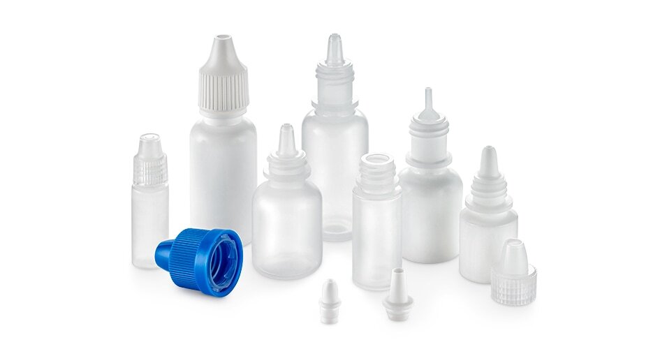 A catalogue group shot of three dropper bottles on a plain background, the original asset the client already owned